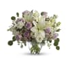 Lovely Lilies and Lavender Roses - Deluxe. An arrangement by Brooklin Floral and Garden Shoppe Inc..