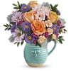 The Busy Bee Pitcher - Deluxe. An arrangement by Flowers of Jacksonville.