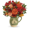 Charming Acorn Teleflora - Standard. An arrangement by Belak Flowers.