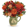Charming Acorn Teleflora - Deluxe. An arrangement by Belak Flowers.