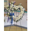 HEART WREATH BLUE AND WHITE - Standard. An arrangement by Unique N Pretty Florist.