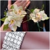 The Perfect Pair Wristlet and Boutonniere Orchids premium