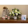 Baby It's Getting Cold Outside - Premium. An arrangement by Loyalist Flowers.
