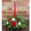 'By Design' Simply Christmas - Premium. An arrangement by Flowers By Design.