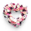 Warm Remembrance Heart Wreath - Deluxe. An arrangement by Appleblossoms.