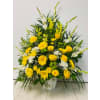 Basket of gold - Deluxe. An arrangement by Jennifer's Flowers and Gifts.