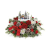 TF Thomas Kinkade's 2024 Skate into the Holidays - Standard. An arrangement by Nicol Florist.