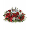 TF Thomas Kinkade's 2024 Skate into the Holidays - Deluxe. An arrangement by Nicol Florist.