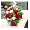 Hugs for the Holidays - Deluxe. An arrangement by Avenue Florist.