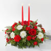 Holiday Soiree Centerpiece ™ FTD® - Deluxe. An arrangement by Grower Direct.