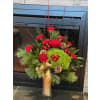 The Classic Christmas - Premium. An arrangement by Loyalist Flowers.