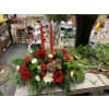 Christmas Village Design - Premium. An arrangement by Sun Valley Florist.