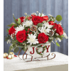 Dashing Through the Snow Joy Sleigh - Premium. An arrangement by Sueppel's Flowers.