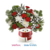 Teleflora's Frosty Wishes - Standard. An arrangement by Love Floral.
