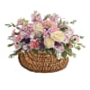 Pastel Dreams Basket - Standard. An arrangement by Geni's Florist and Gifts.