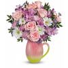 The Spring Tulip Pitcher by Teleflora - Premium. An arrangement by Sueppel's Flowers.