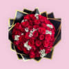 Red Ramo Buchon - Deluxe. An arrangement by Charming Blooms.