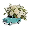 Teleflora's Classic Chevy Pickup Bouquet - Deluxe. An arrangement by Believe Flowers.