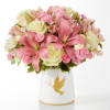 Gentle Healing by FTD - Premium. An arrangement by North Liberty Flower Shop.