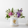 Garden of Peach by FTD - Standard. An arrangement by North Liberty Flower Shop.