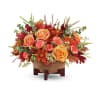 Modern Copper Centerpiece - Deluxe. An arrangement by Sueppel's Flowers.