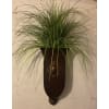 Wall Sconce - Deluxe. An arrangement by The Flower Box Florist.