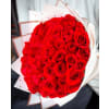 Hand-Tied Wrap Presentation Bouquet - Standard. An arrangement by Brickell Exclusive Blooms.
