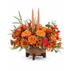 Harvest Flame Centerpiece - Premium. An arrangement by Flore's Shop.