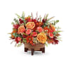Teleflora's Modern Copper Centerpiece - Deluxe. An arrangement by Michael's Flowers.