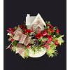 The North Pole Hideaway Centrepiece - Standard. An arrangement by Hillcrest Florist.