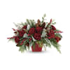 Holiday Hearth Blooms - Premium. An arrangement by Flore's Shop.