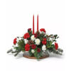 Teleflora's holiday arrangement in a keepsake dish - Standard. An arrangement by Nicol Florist.