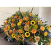Autumn tribute, Casket Spray - Deluxe. An arrangement by Tom's Florist.