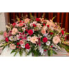 Pink and Crimson Remembrance Casket Spray - Standard. An arrangement by Tom's Florist.