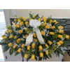 Yellow Rose Tribute Casket Spray - Standard. An arrangement by Tom's Florist.