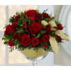 Golden Christmas Centerpiece - Premium. An arrangement by Brickell Ave Florist.
