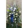 Blue and white tribute spray - Deluxe. An arrangement by Tom's Florist.