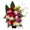 Crimson Orchid Elegance - Premium. An arrangement by Flowers by Peter.