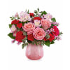 Teleflora's Sweet On Hue - Deluxe. An arrangement by Nicol Florist.