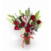 The one (Roses + lilies) - Standard. An arrangement by La Bolsa Rosa.