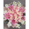 Lily Kissed Romance - Premium. An arrangement by Geni's Florist and Gifts.
