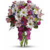 Daisy Kisses and Rose Wishes - Deluxe. An arrangement by Leland Florist.