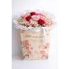 Romance to Go - Standard. An arrangement by Geni's Florist and Gifts.