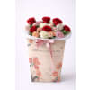 Romance to Go - Deluxe. An arrangement by Geni's Florist and Gifts.