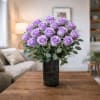 PREMIUM LAVENDER ROSES - Standard. An arrangement by Petals and Co..