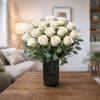 PREMIUM WHITE ROSES - Standard. An arrangement by Petals and Co..