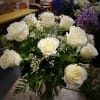 WHITE ROSE - Deluxe. An arrangement by Sun Valley Florist.