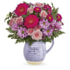 Pour On The Lavender Bouquet - Standard. An arrangement by Flowers of Jacksonville.