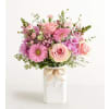 Honey Bee Buzz For Spring - Deluxe. An arrangement by Serrano Flowers.