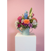 Forever Blooming Watering Can - Premium. An arrangement by Blushing Flowers.